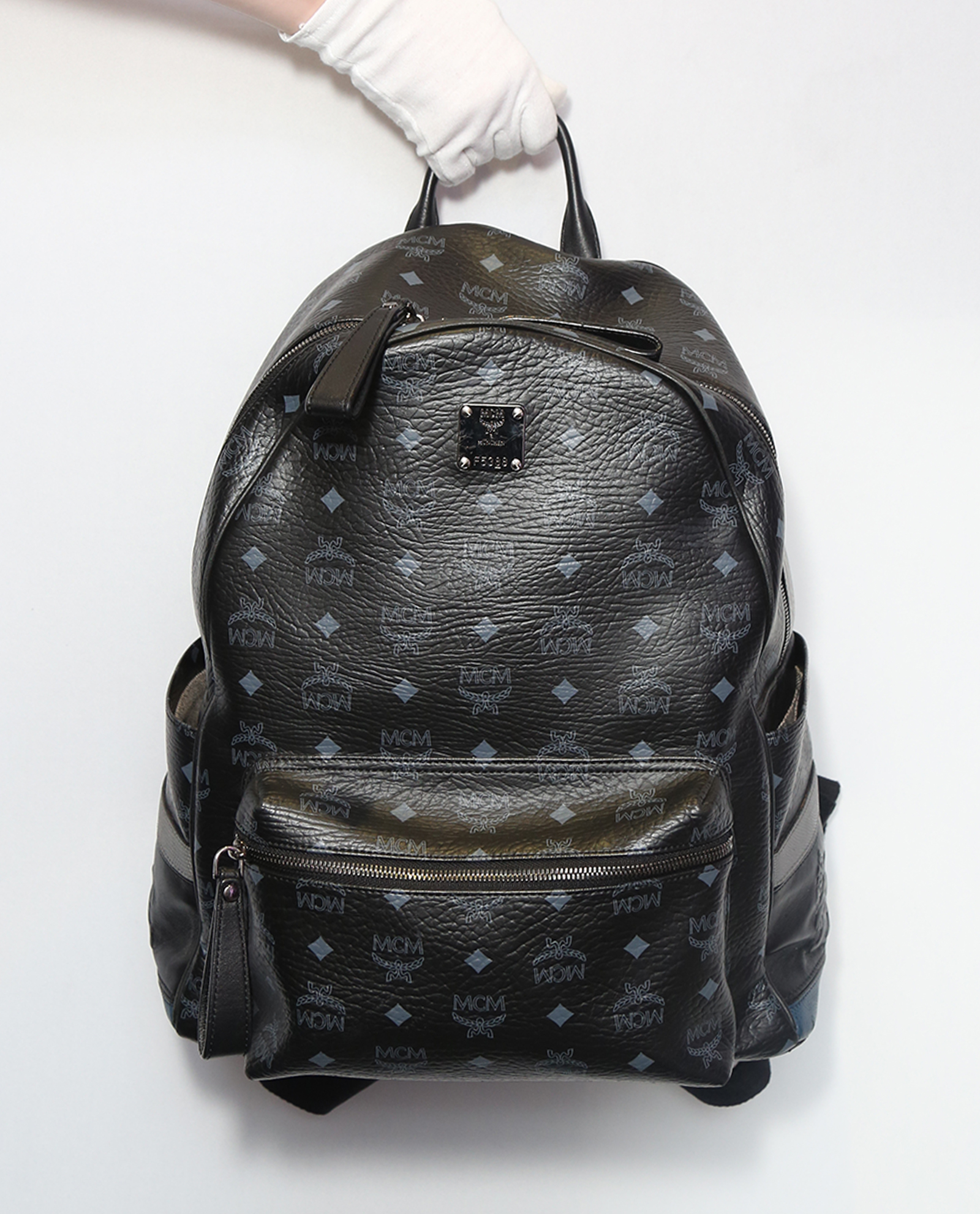 Mcm lion backpack hotsell